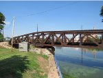 Wisconsin Central Railroad spur to Expera. Railroad bridge crossing the Fox River lock & canal